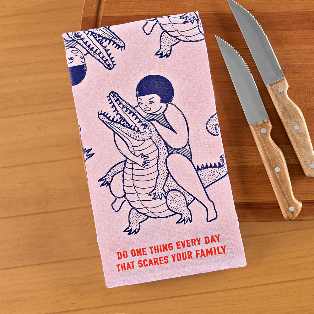 Blue Q Tea Towel, "Do One Thing Every Day That Scares Your Family"
